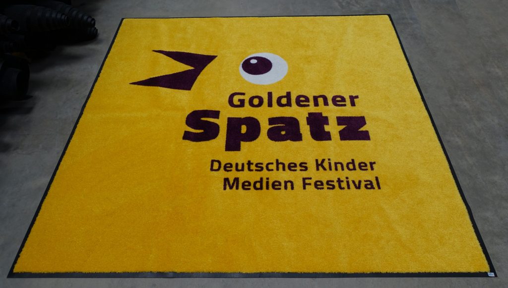 Logomatte Colorstar Goldener Spatz