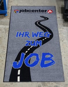 Große Schmutzfangmatten für Jobcenter mit Logo